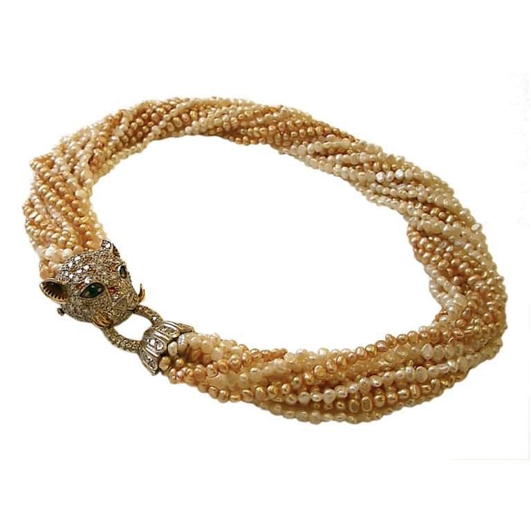 A Diamond, Colored Diamond and Pearl Torsade by Trio